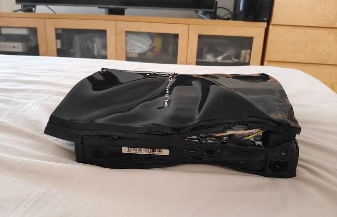 真“煮”机！ 国外网友另类方式成功修理损坏PS3